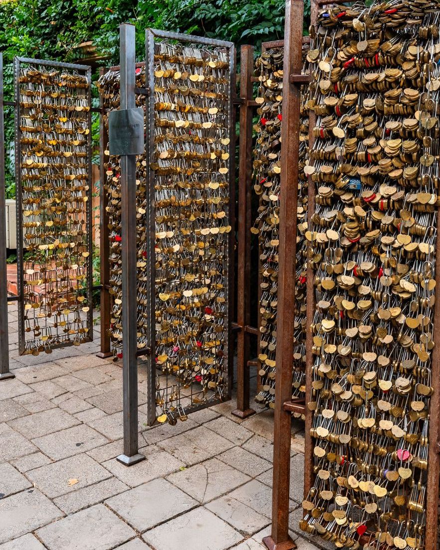The love-lock gate, covered in hundreds of brass heart-shaped locks